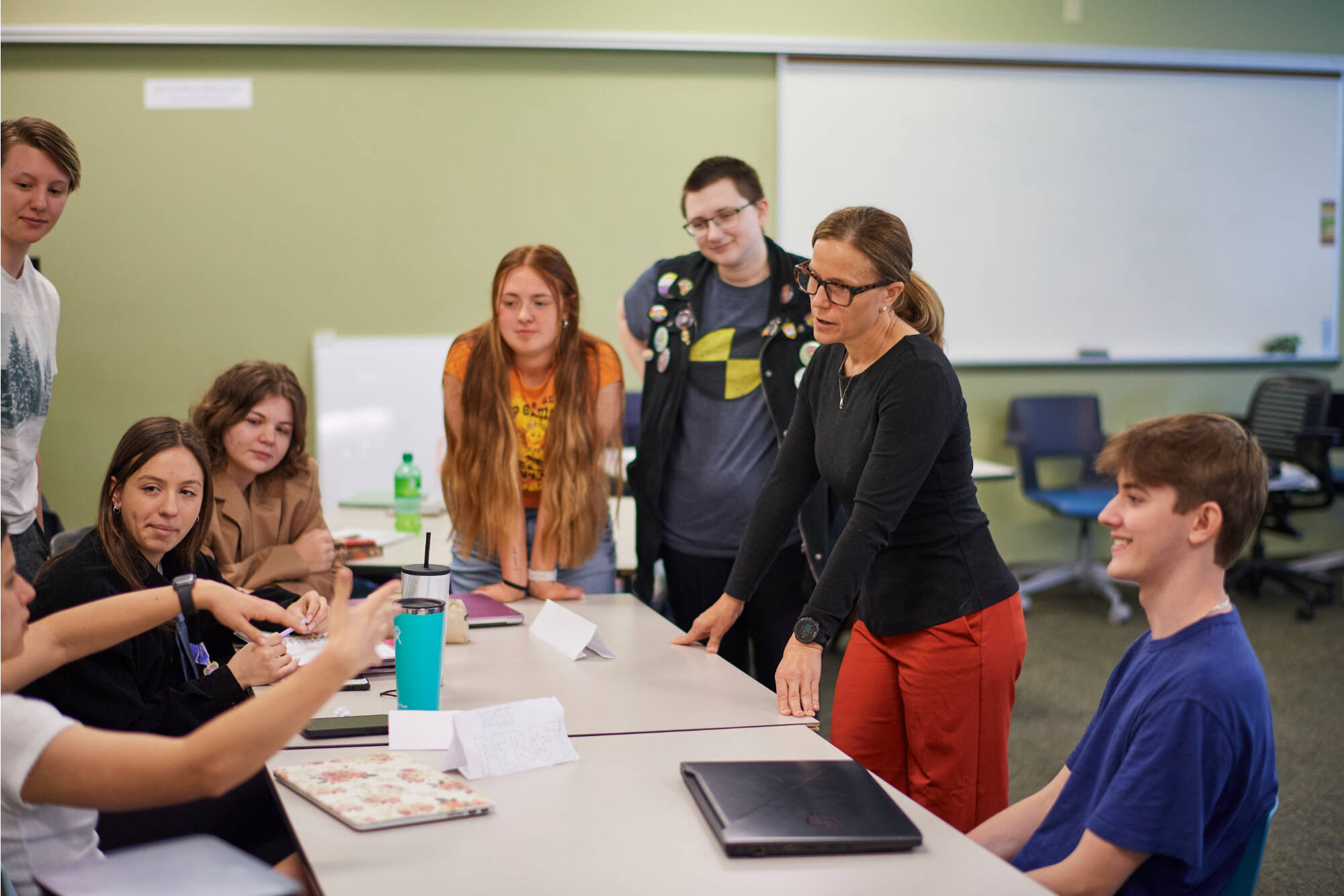 Professor talking with students